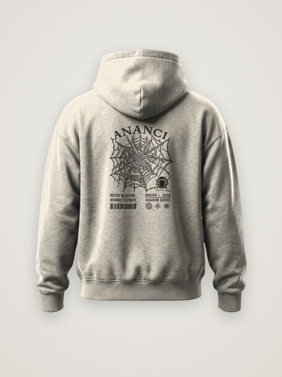 Back of the cream ANANCI Shadow Series Hoodie with the intricate spider web graphic in black ink under an arched ANANCI wordmark, Shadow Series