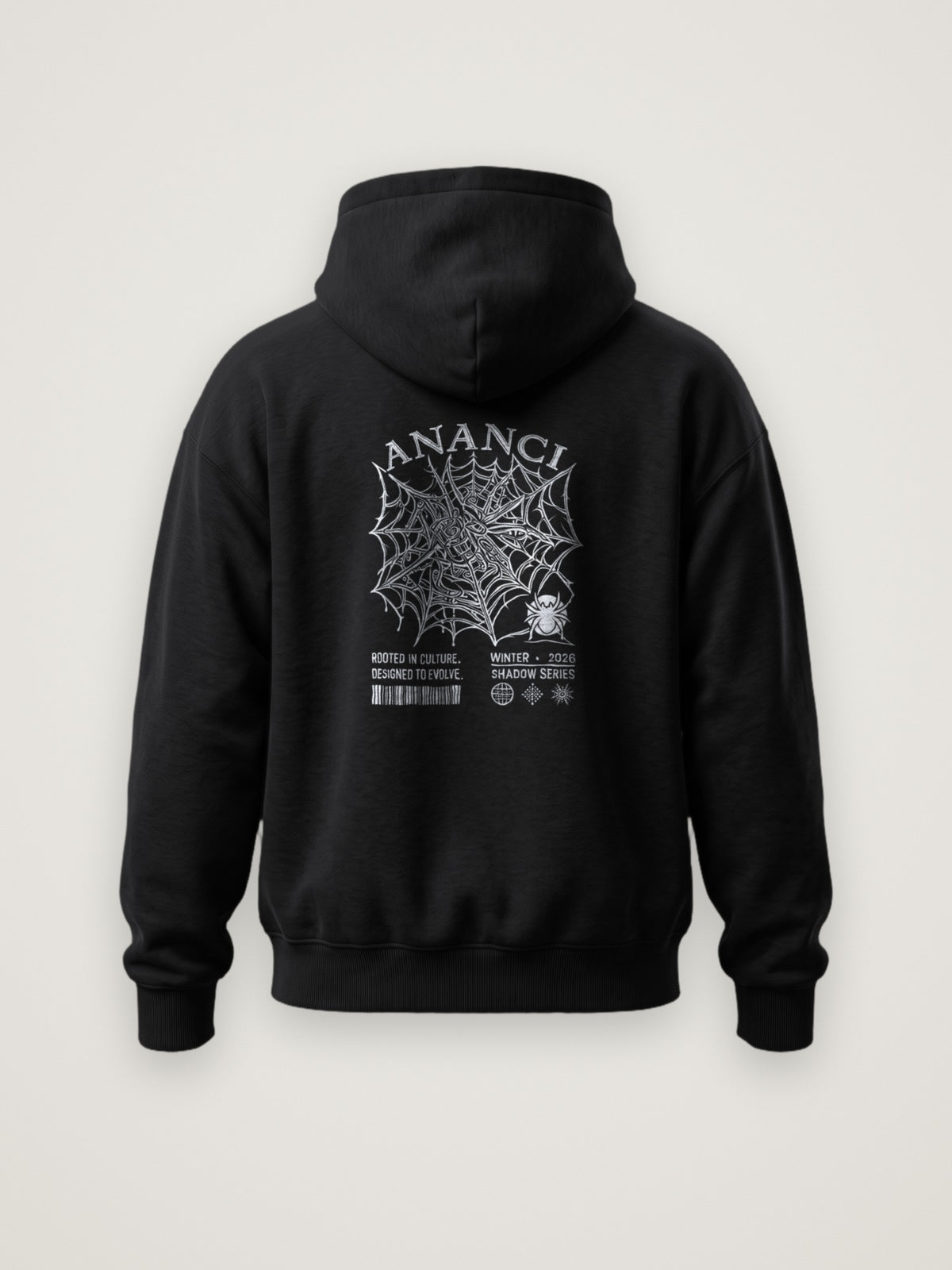 Back of the black ANANCI Shadow Series Hoodie with the intricate spider web graphic in silver-tone ink under an arched ANANCI wordmark, Shadow Series