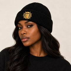 Ananci Signature Beanie in black with gold embroidered spider patch