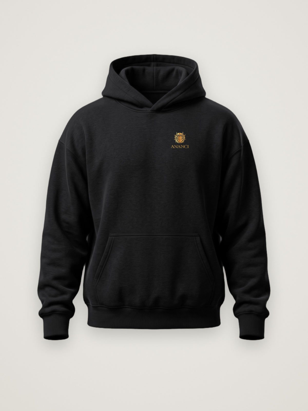 Front of the black ANANCI The Storyteller Hoodie with the gold ANANCI spider crest and wordmark at the left chest
