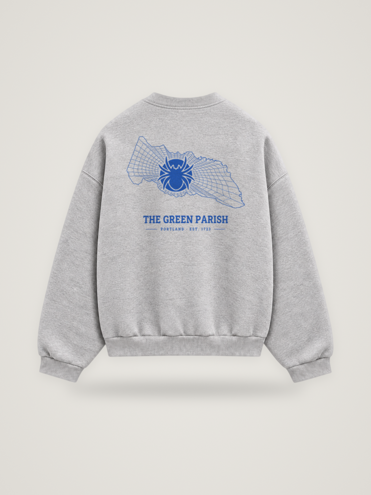 Back of the heather grey ANANCI Where Yuh From? Portland crewneck with the Portland map, web and spider in cobalt ink, “THE GREEN PARISH” and PORTLAND · EST. 1723