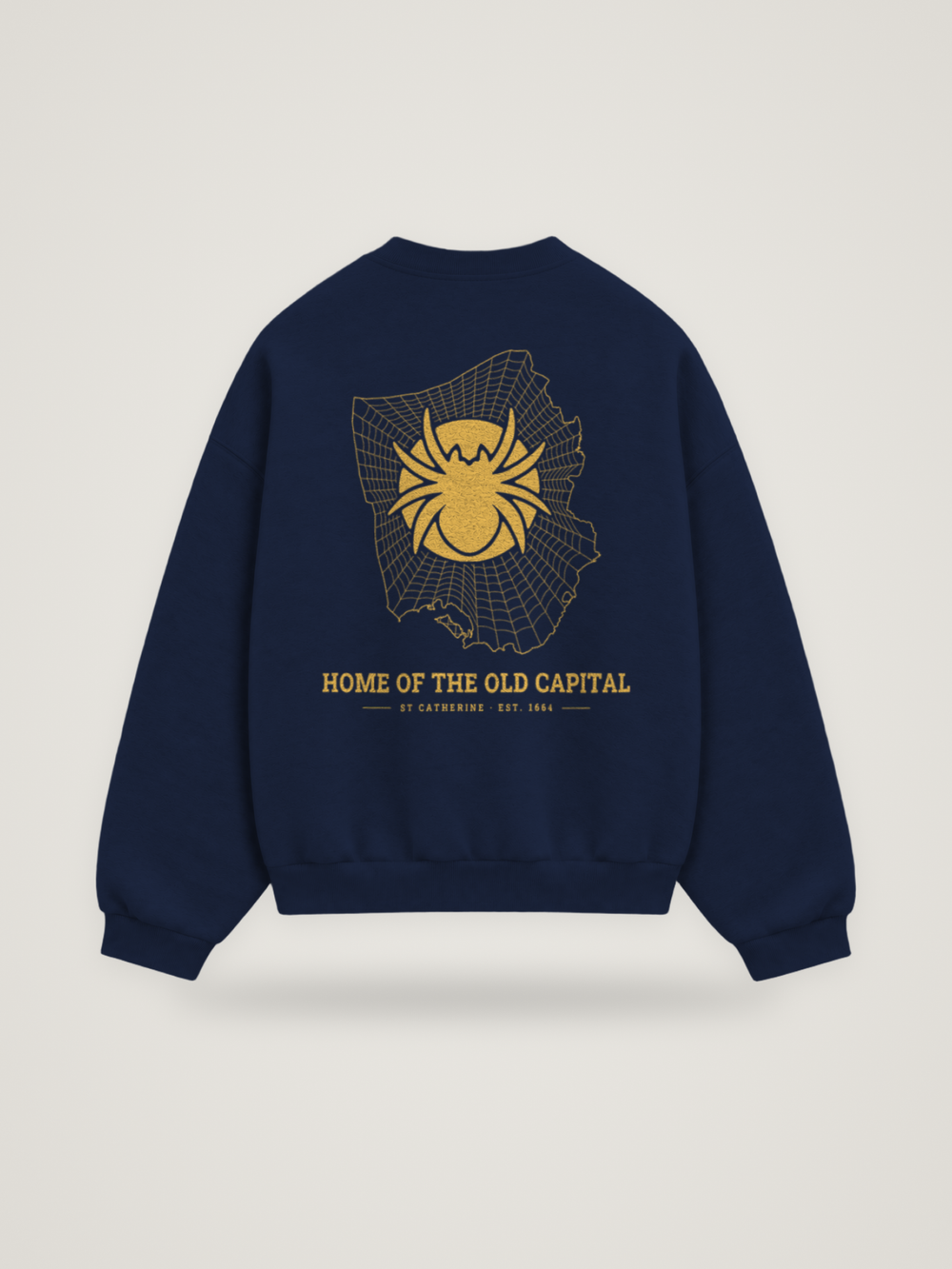 Back of the midnight ANANCI Where Yuh From? St Catherine crewneck with the St Catherine map, web and spider in gold ink, “HOME OF THE OLD CAPITAL” and ST CATHERINE · EST. 1664