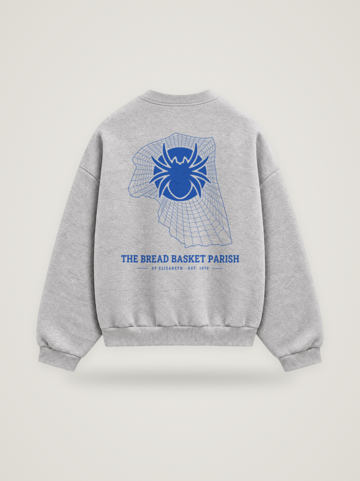Back of the heather grey ANANCI Where Yuh From? St Elizabeth crewneck with the St Elizabeth map, web and spider in cobalt ink, “THE BREAD BASKET PARISH” and ST ELIZABETH · EST. 1670