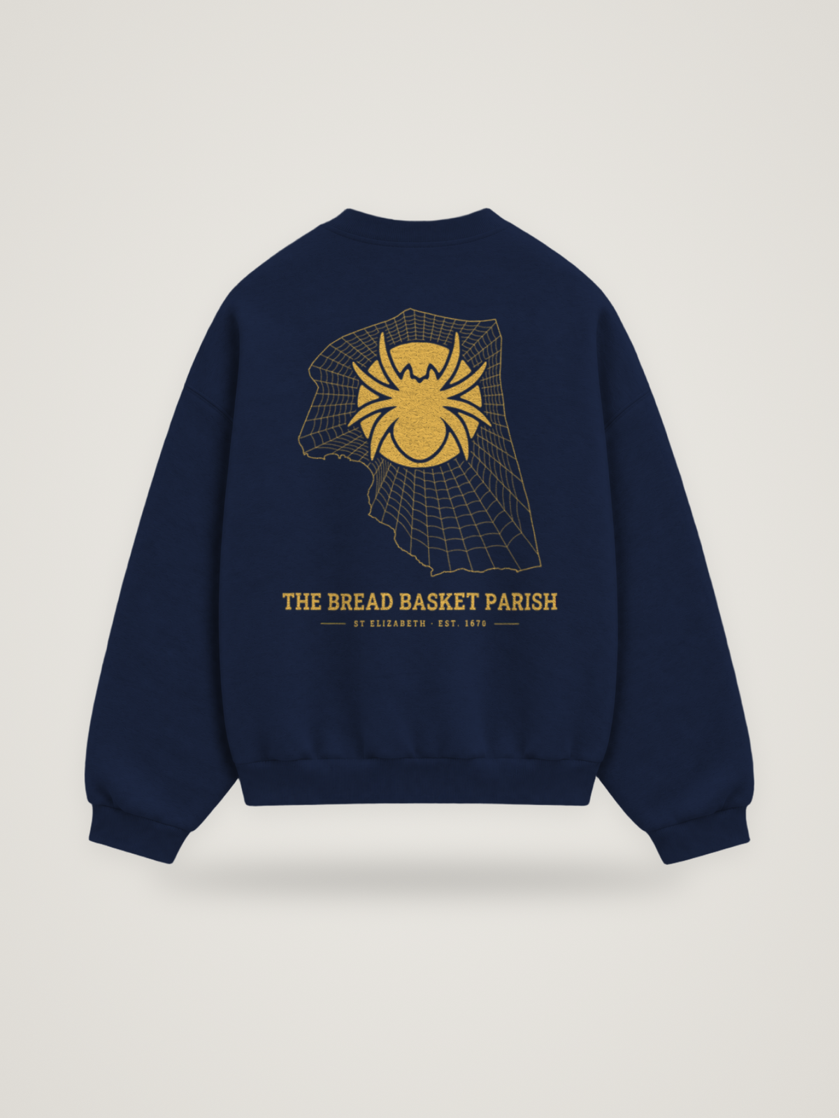 Back of the midnight ANANCI Where Yuh From? St Elizabeth crewneck with the St Elizabeth map, web and spider in gold ink, “THE BREAD BASKET PARISH” and ST ELIZABETH · EST. 1670
